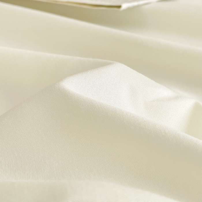 91家纺网 家纺一手货源 找家纺 北辰 2025新款简约素色云朵棉可水洗纯色床笠单件三件套 奶昔白