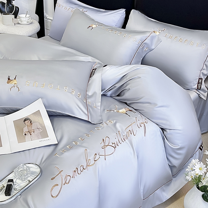 91家纺网 家纺一手货源 找家纺  2025新款夏季爆款A类兰精天丝四件套真丝重工刺绣丝滑裸睡床单床笠轻奢风纯色简约床上用品 妮鹿-朦胧灰