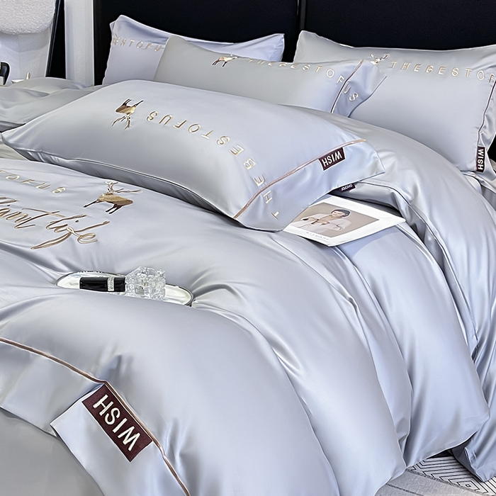 91家纺网 家纺一手货源 找家纺  2025新款夏季爆款A类兰精天丝四件套真丝重工刺绣丝滑裸睡床单床笠轻奢风纯色简约床上用品 妮鹿-朦胧灰