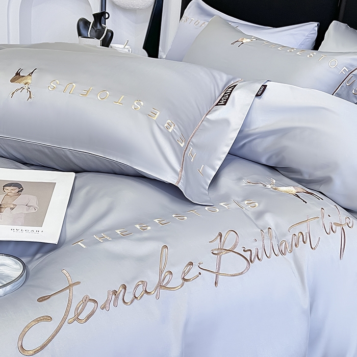 91家纺网 家纺一手货源 找家纺  2025新款夏季爆款A类兰精天丝四件套真丝重工刺绣丝滑裸睡床单床笠轻奢风纯色简约床上用品 妮鹿-朦胧灰