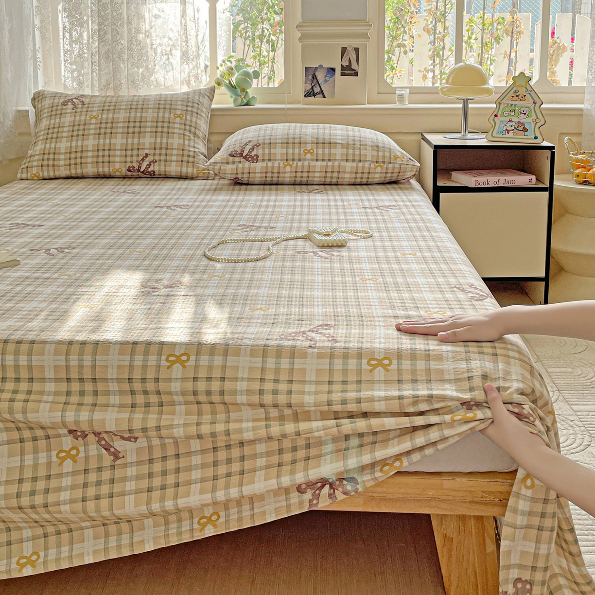 91家纺网 家纺一手货源 找家纺 暖芯优选 2025新款母婴级ins小清新双层纱印花床单枕套三件套（提供买家秀） 条格蝴蝶结