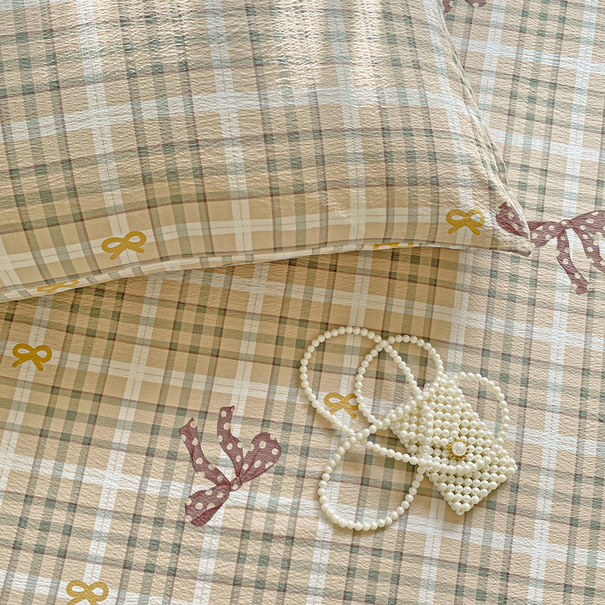 91家纺网 家纺一手货源 找家纺 暖芯优选 2025新款母婴级ins小清新双层纱印花床单枕套三件套（提供买家秀） 条格蝴蝶结