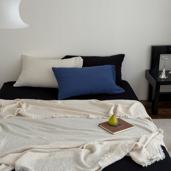 91家纺网 家纺一手货源 找家纺 山舍家居 2025新款全棉四层纱流苏盖毯第三批 床拍图 奶油白