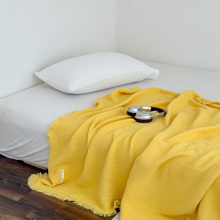 91家纺网 家纺一手货源 找家纺 山舍家居 2025新款全棉四层纱流苏盖毯第三批 床拍图 柠檬黄