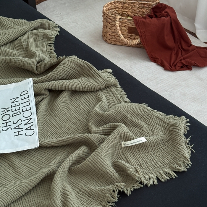 91家纺网 家纺一手货源 找家纺 山舍家居 2025新款全棉四层纱流苏盖毯第三批 床拍图 松石绿