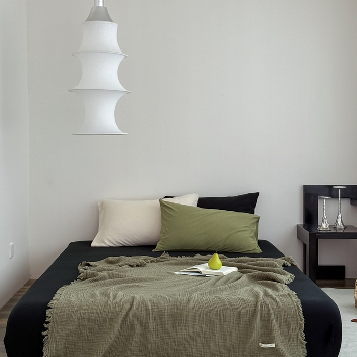 91家纺网 家纺一手货源 找家纺 山舍家居 2025新款全棉四层纱流苏盖毯第三批 床拍图 松石绿