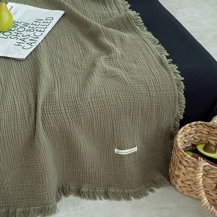 91家纺网 家纺一手货源 找家纺 山舍家居 2025新款全棉四层纱流苏盖毯第三批 床拍图 松石绿