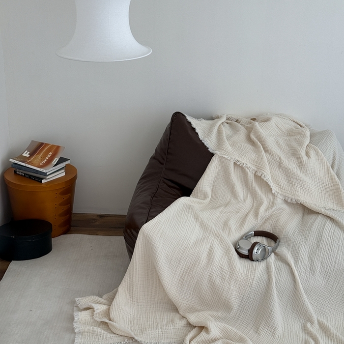 91家纺网 家纺一手货源 找家纺 山舍家居 2025新款全棉四层纱流苏盖毯第三批沙发图 奶油白