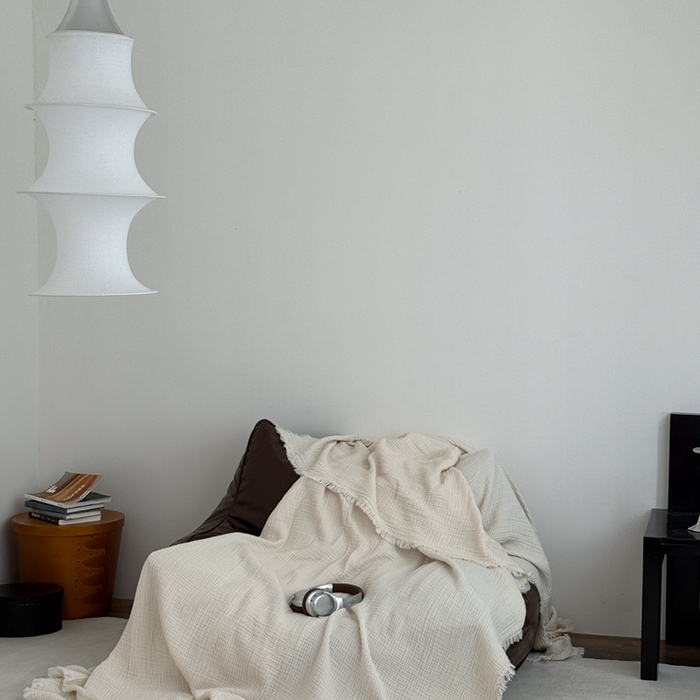 91家纺网 家纺一手货源 找家纺 山舍家居 2025新款全棉四层纱流苏盖毯第三批沙发图 奶油白