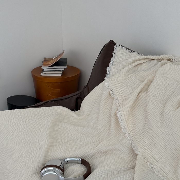 91家纺网 家纺一手货源 找家纺 山舍家居 2025新款全棉四层纱流苏盖毯第三批沙发图 奶油白