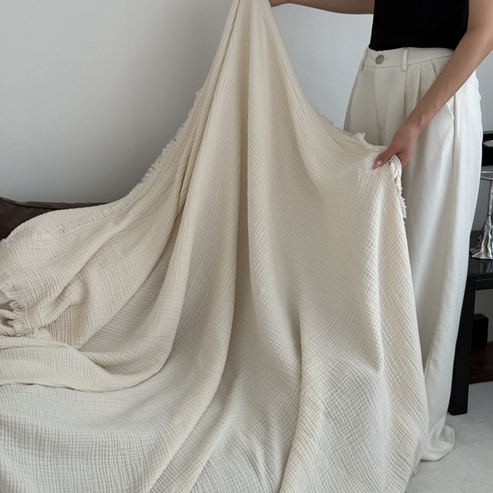 91家纺网 家纺一手货源 找家纺 山舍家居 2025新款全棉四层纱流苏盖毯第三批沙发图 奶油白