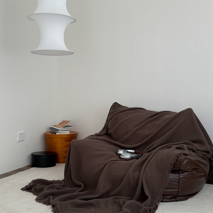 91家纺网 家纺一手货源 找家纺 山舍家居 2025新款全棉四层纱流苏盖毯第三批沙发图 陶泥