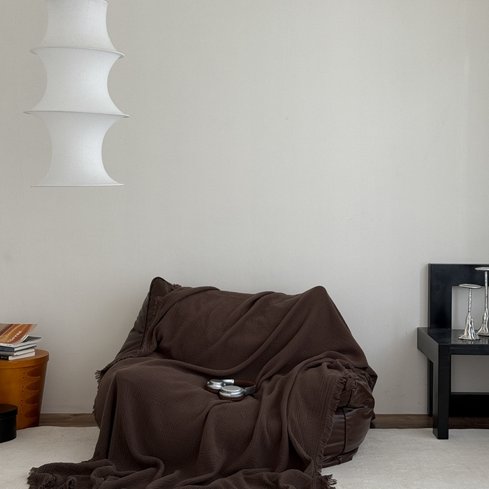 91家纺网 家纺一手货源 找家纺 山舍家居 2025新款全棉四层纱流苏盖毯第三批沙发图 陶泥