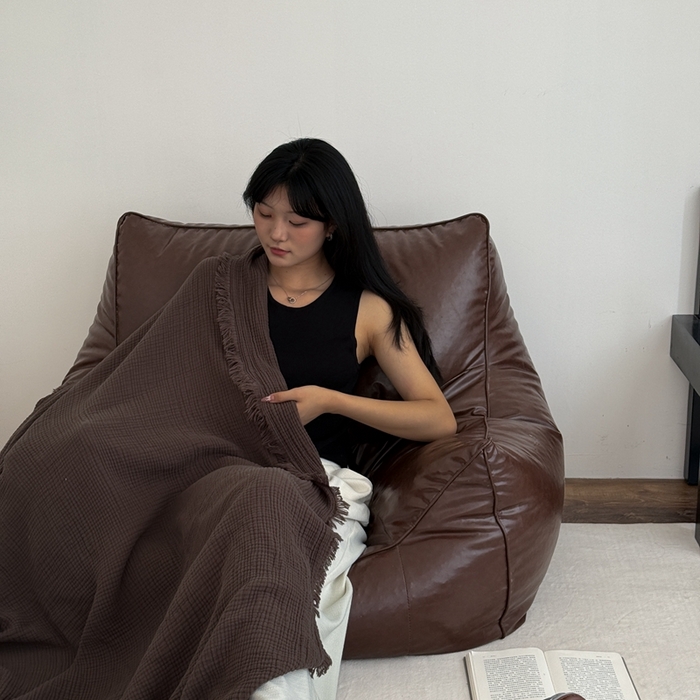 91家纺网 家纺一手货源 找家纺 山舍家居 2025新款全棉四层纱流苏盖毯第三批沙发图 陶泥