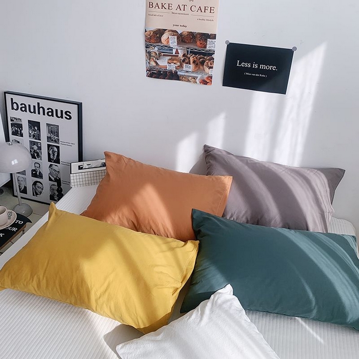 91家纺网 家纺一手货源 找家纺 柚可家居 2024新款纯色水洗棉40支全棉色织单枕套-系列三 白青年