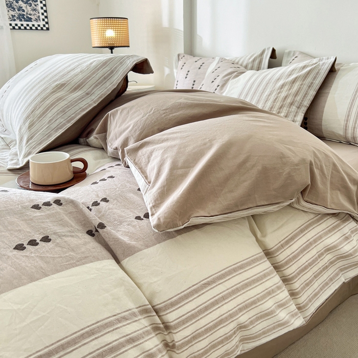 91家纺网 家纺一手货源 找家纺 小懒猪2025色织水洗棉提花四件套 爱心条咖