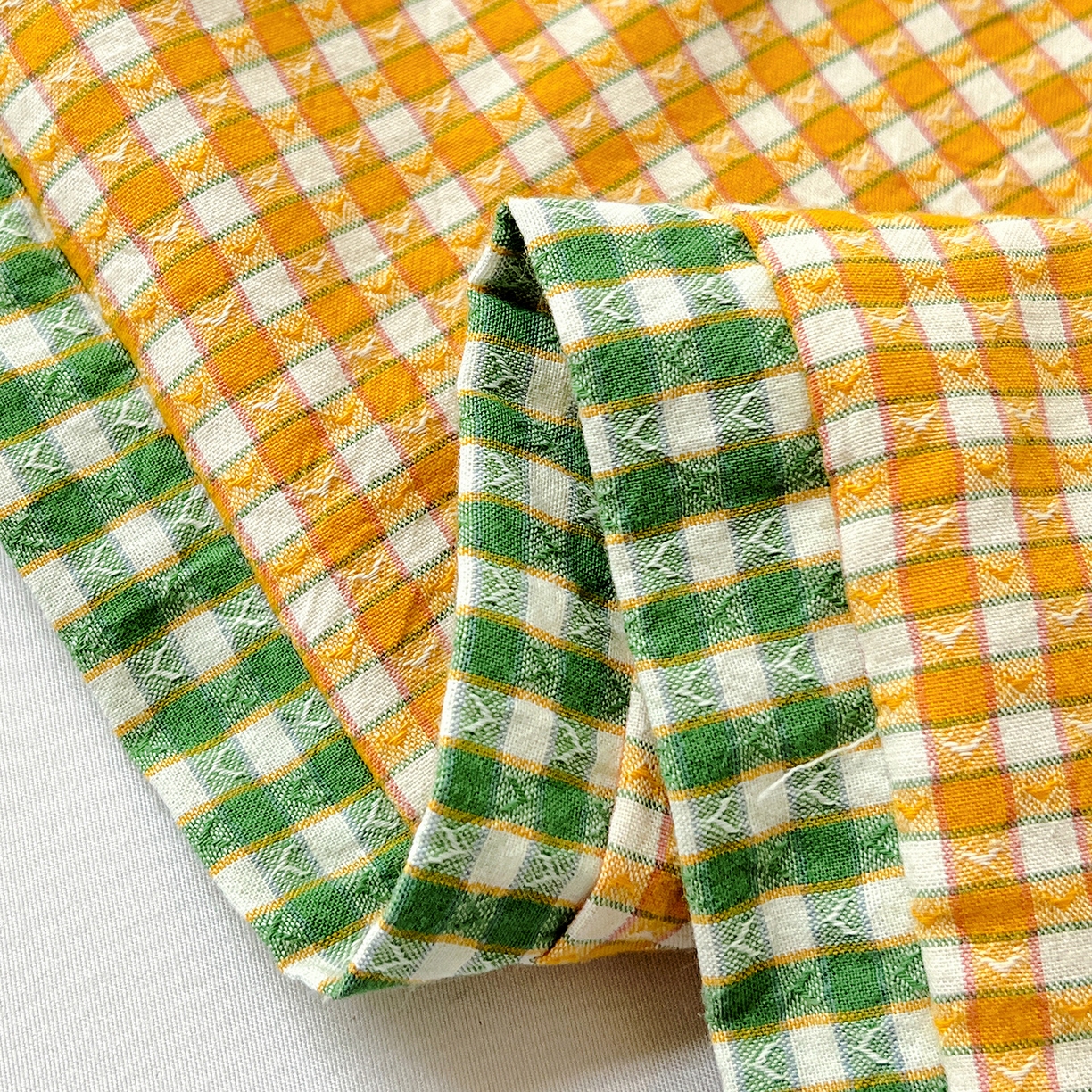 91家纺网 家纺一手货源 找家纺 梦莱家纺 2025春夏新款全棉双拼刺绣荞麦壳枕头pp棉枕芯 小熊猫-橙黄色 35x55cm枕套加羽丝棉内芯