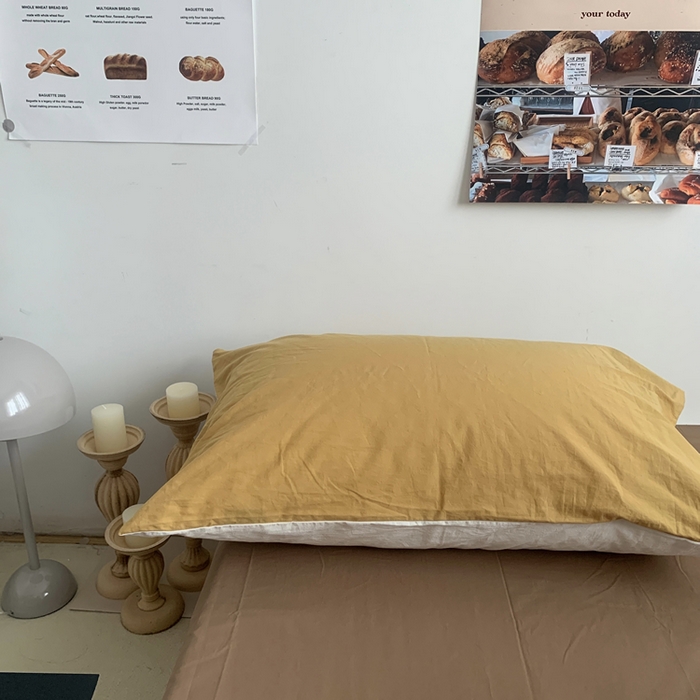 91家纺网 家纺一手货源 找家纺 柚可家居 2024新款40支全棉色织水洗棉单品系列-单枕套 姜黄拼白