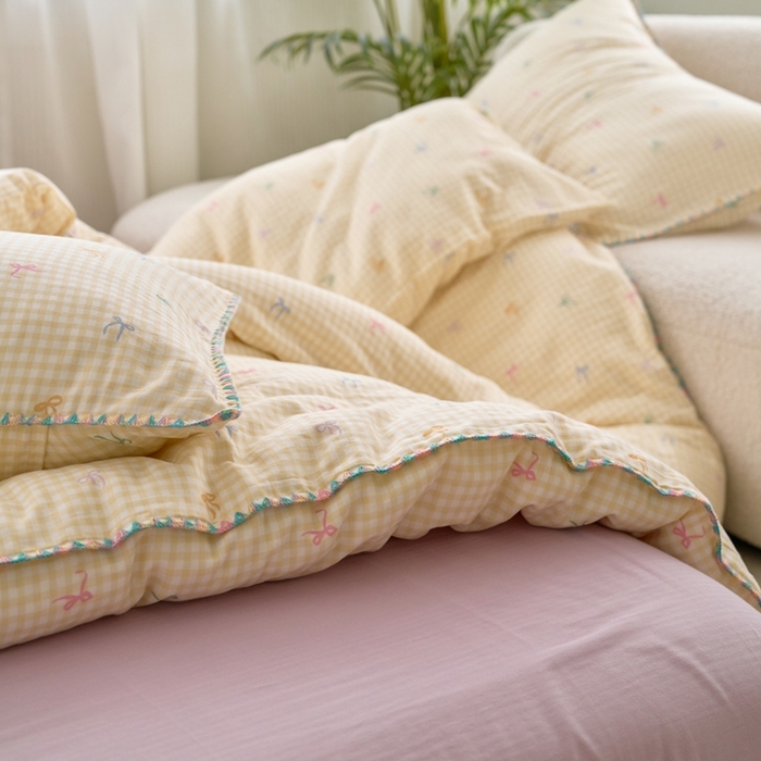 91家纺网 家纺一手货源 找家纺 洋铭区（原狠狠爱） 2025新款全棉彩边双层四件套 奶黄蝴蝶结