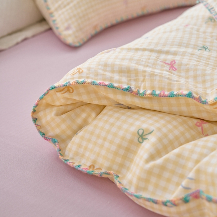 91家纺网 家纺一手货源 找家纺 洋铭区（原狠狠爱） 2025新款全棉彩边双层四件套 奶黄蝴蝶结