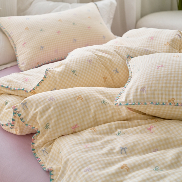 91家纺网 家纺一手货源 找家纺 洋铭区（原狠狠爱） 2025新款全棉彩边双层四件套 奶黄蝴蝶结