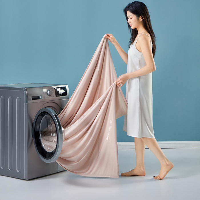 91家纺网 家纺一手货源 找家纺 玛德琳 2025新款冷暖深睡控温夏被 橘雾粉