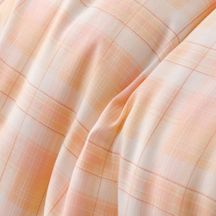 91家纺网 家纺一手货源 找家纺 易展2025新款无印水洗棉格子大豆冬被 浅轻粉