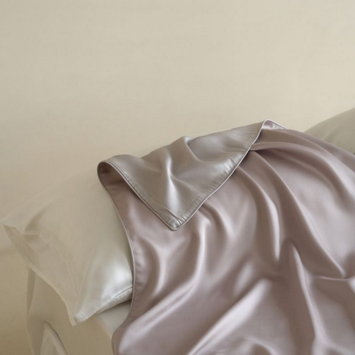 91家纺网 家纺一手货源 找家纺 咏绒家纺工厂店 2025新款A类奥地利进口天丝盖毯系列 -风格二 凝脂紫