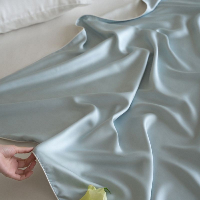 91家纺网 家纺一手货源 找家纺 咏绒家纺工厂店 2025新款A类奥地利进口天丝盖毯系列 -风格二 秋波蓝