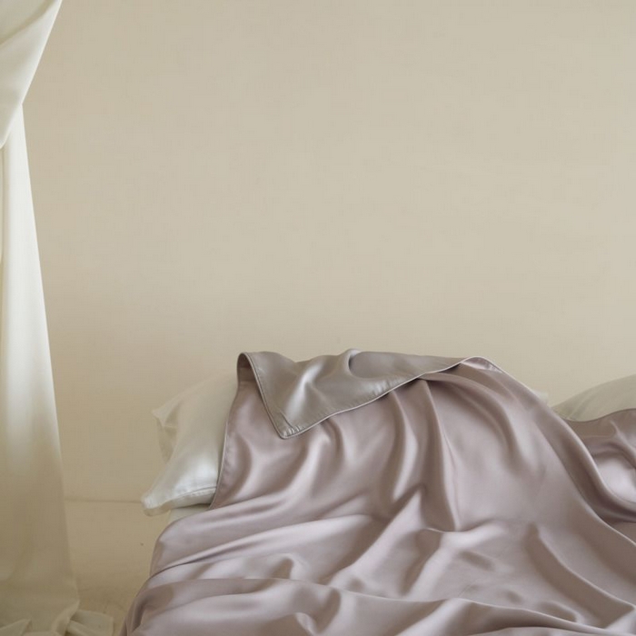 91家纺网 家纺一手货源 找家纺 咏绒家纺工厂店 2025新款A类奥地利进口天丝盖毯系列 -风格二 凝脂紫