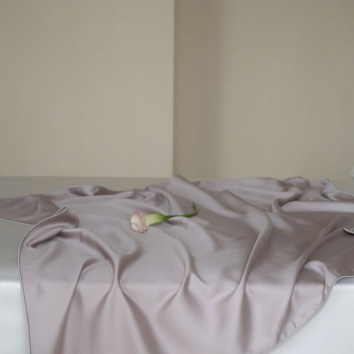 91家纺网 家纺一手货源 找家纺 咏绒家纺工厂店 2025新款A类奥地利进口天丝盖毯系列 -风格二 凝脂紫