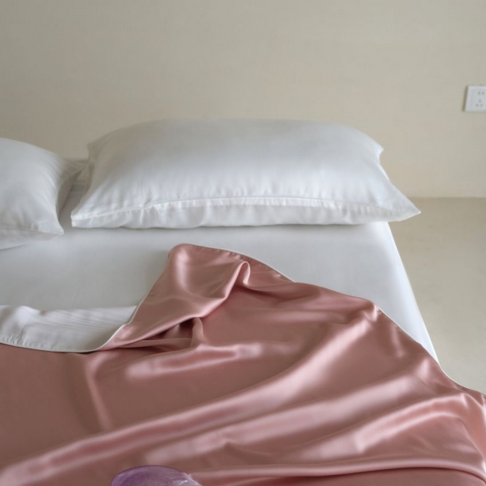 91家纺网 家纺一手货源 找家纺 咏绒家纺工厂店 2025新款A类奥地利进口天丝盖毯系列 -风格二 桃之夭夭