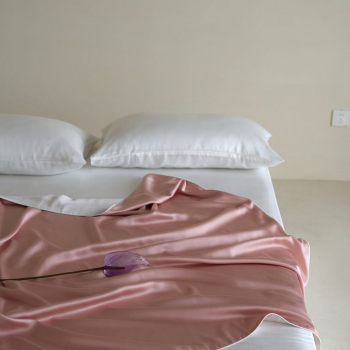 91家纺网 家纺一手货源 找家纺 咏绒家纺工厂店 2025新款A类奥地利进口天丝盖毯系列 -风格二 桃之夭夭