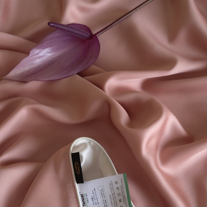 91家纺网 家纺一手货源 找家纺 咏绒家纺工厂店 2025新款A类奥地利进口天丝盖毯系列 -风格二 桃之夭夭