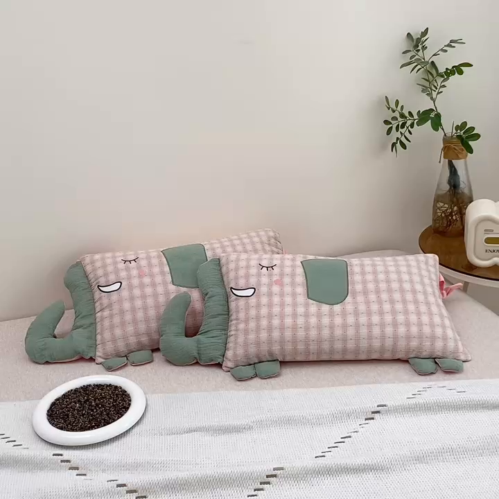 91家纺网 家纺一手货源 找家纺 珍贝2025新款全棉水洗棉儿童学生枕荞麦枕 酣睡象-粉色30*35一对