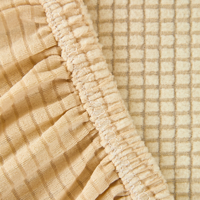 91家纺网 家纺一手货源 找家纺 逐日沙发套2025新款玉米绒沙发床套 米黄