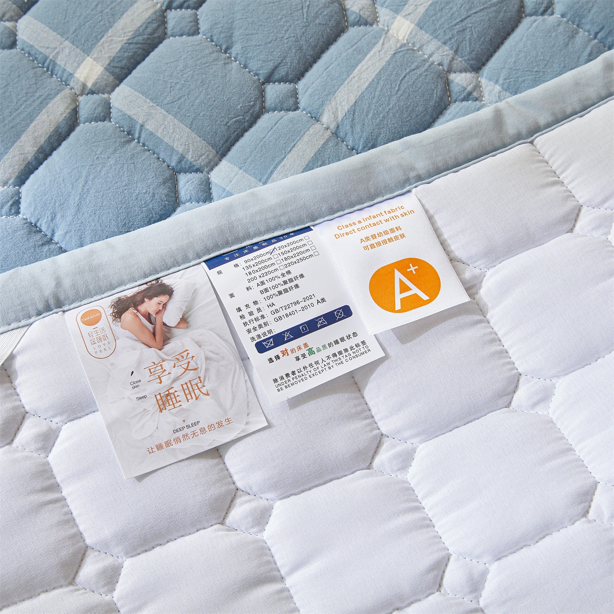91家纺网 家纺一手货源 找家纺 恒爱家纺 2025新款全棉印花格子床垫 蓝灰中格