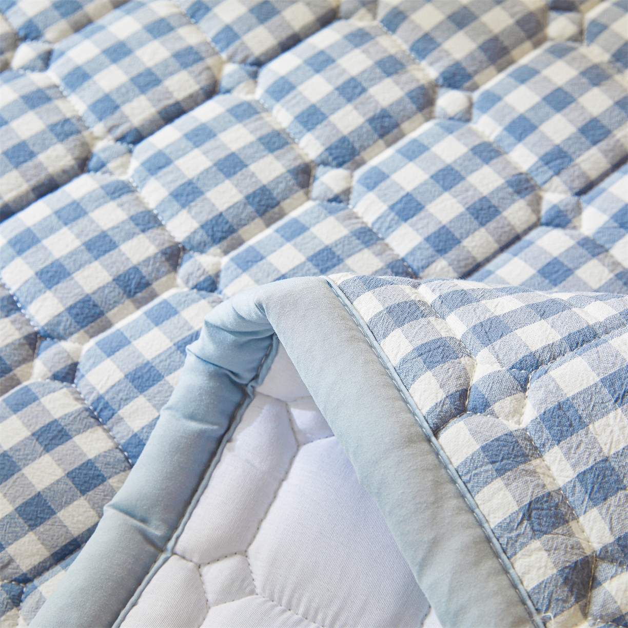 91家纺网 家纺一手货源 找家纺 恒爱家纺 2025新款全棉印花格子床垫 蓝小格