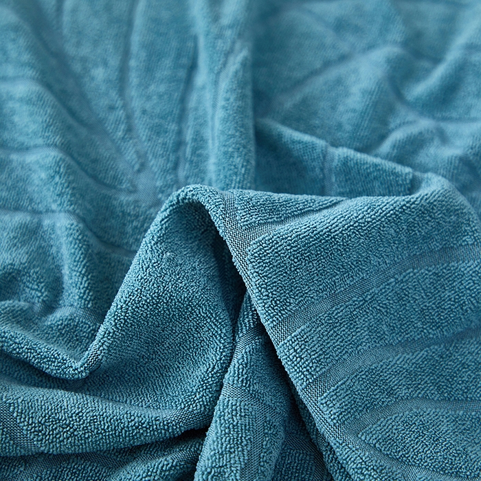 91家纺网 家纺一手货源 找家纺 逐日沙发套2025新款大树叶沙发床套 防水提花大树叶 -湖蓝