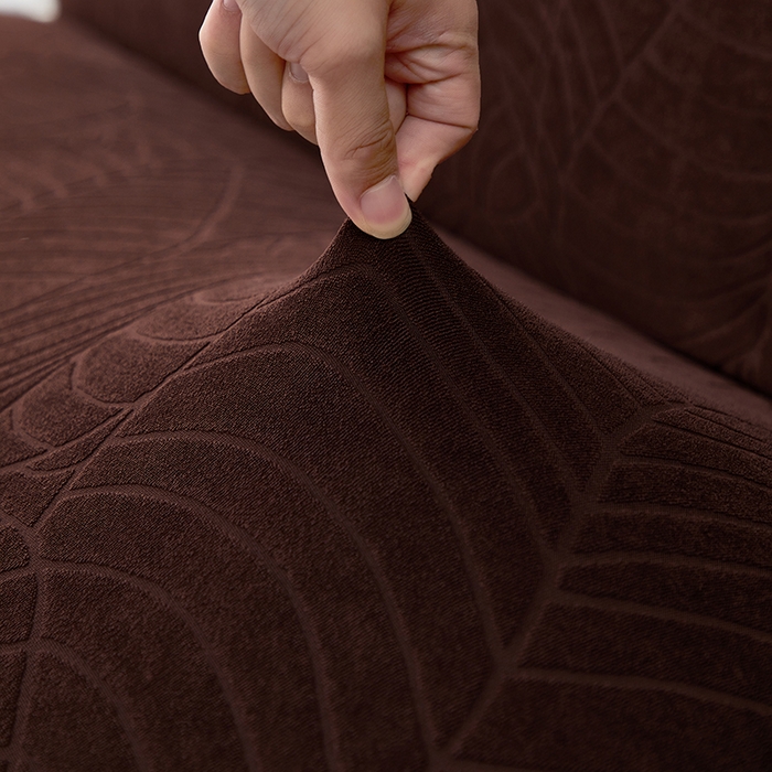 91家纺网 家纺一手货源 找家纺 逐日沙发套2025新款大树叶沙发床套 防水提花大树叶 -深咖