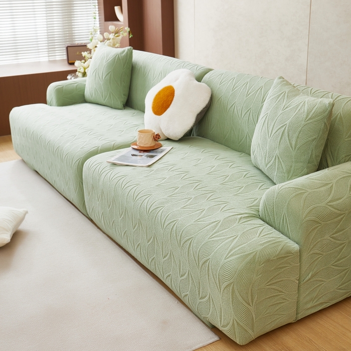 91家纺网 家纺一手货源 找家纺 丝绮鹿 2025新款雕花绒玉叶沙发套直排松紧款 玉叶-草绿