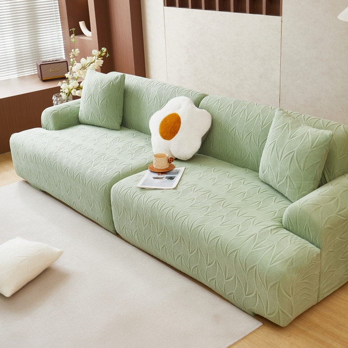 91家纺网 家纺一手货源 找家纺 丝绮鹿 2025新款雕花绒玉叶沙发套直排松紧款 玉叶-草绿