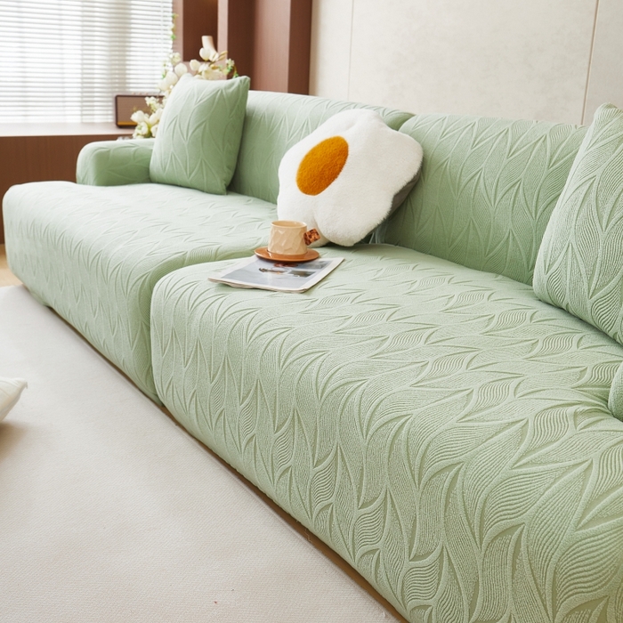 91家纺网 家纺一手货源 找家纺 丝绮鹿 2025新款雕花绒玉叶沙发套直排松紧款 玉叶-草绿