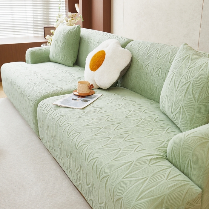 91家纺网 家纺一手货源 找家纺 丝绮鹿 2025新款雕花绒玉叶沙发套直排松紧款 玉叶-草绿