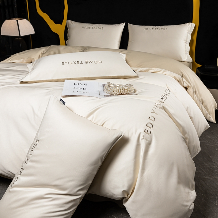 91家纺网 家纺一手货源 找家纺 泰迪爱兰Teddy 2025新款100支（50支）全棉贡缎字母绣花四件套 象牙白+柔和绿