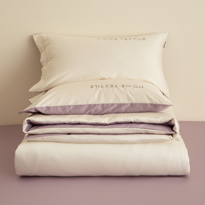 91家纺网 家纺一手货源 找家纺 泰迪爱兰Teddy 2025新款100支（50支）全棉贡缎字母绣花四件套 象牙白+加伦紫