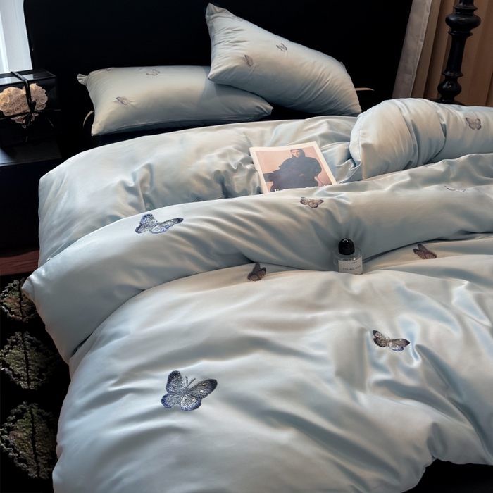 91家纺网 家纺一手货源 找家纺 红嘴企鹅2025新款幻影冰丝四件套-蝴蝶系列 幻影-兰色