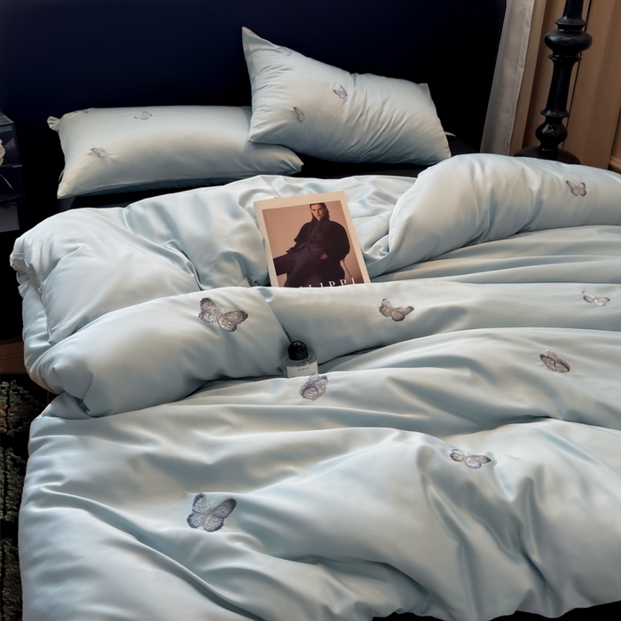 91家纺网 家纺一手货源 找家纺 红嘴企鹅2025新款幻影冰丝四件套-蝴蝶系列 幻影-兰色