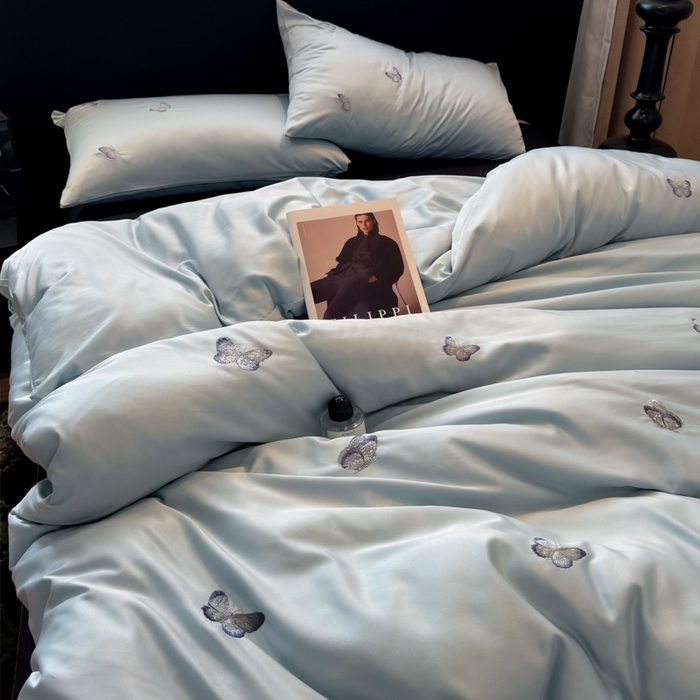 91家纺网 家纺一手货源 找家纺 红嘴企鹅2025新款幻影冰丝四件套-蝴蝶系列 幻影-兰色