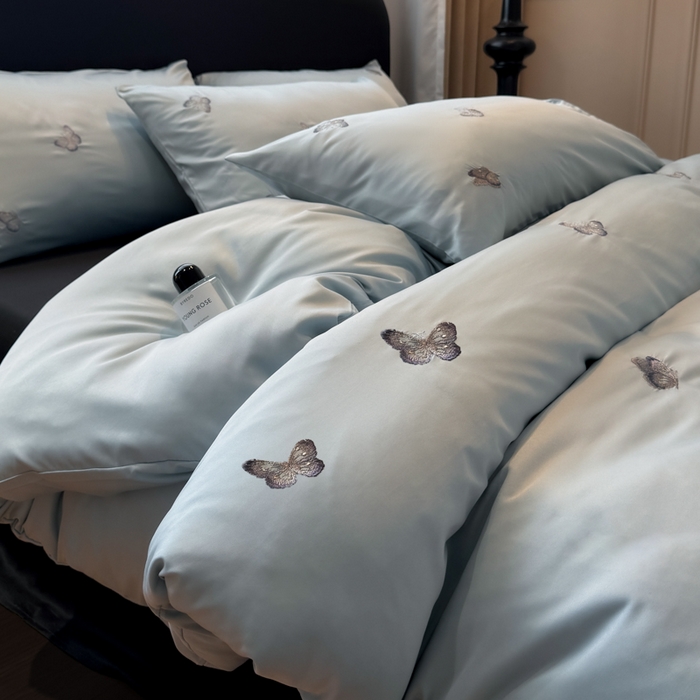 91家纺网 家纺一手货源 找家纺 红嘴企鹅2025新款幻影冰丝四件套-蝴蝶系列 幻影-兰色